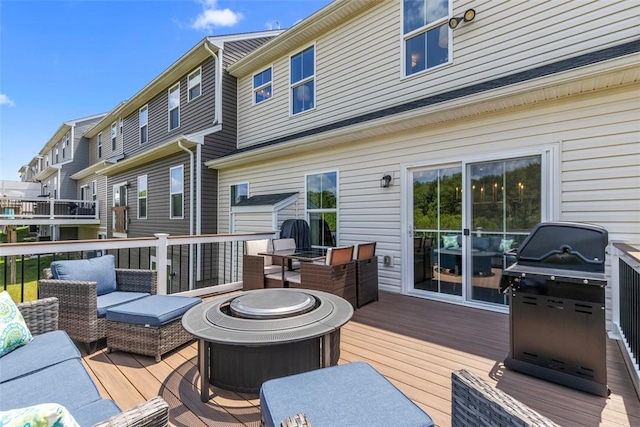 134 Black Oak Ln, Cecil, PA 15057 - wooden deck with grilling area and an outdoor living space with a fire pit