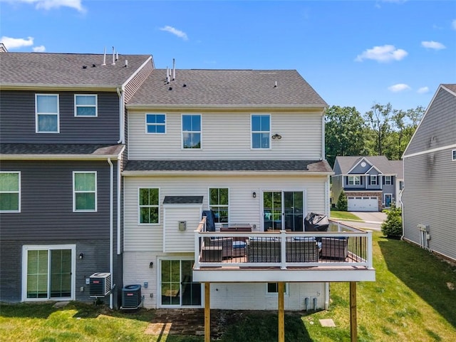 134 Black Oak Ln, Cecil, PA 15057 - back of property with a lawn and a wooden deck