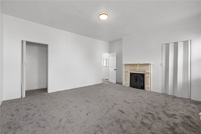 116 Walter, Allentown, PA 15210 - unfurnished living room featuring carpet floors and a fireplace