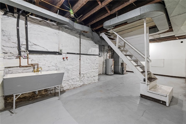 116 Walter, Allentown, PA 15210 - unfinished below grade area featuring water heater and stairs