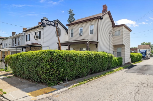 116 Walter, Allentown, PA 15210 - view of side of property featuring a chimney and cooling unit