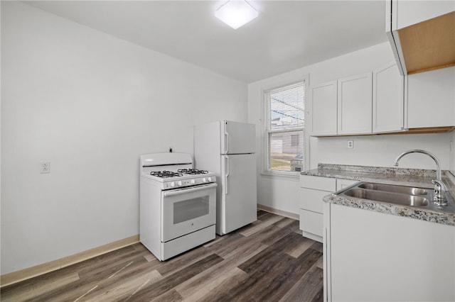 116 Walter, Allentown, PA 15210 - kitchen featuring white appliances, dark wood finished floors, white cabinetry, and light countertops