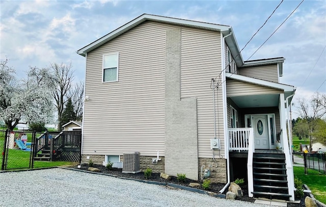 39 Delmont Ave, Delmont, PA 15626 - view of home's exterior with a cooling unit and a porch