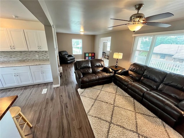 39 Delmont Ave, Delmont, PA 15626 - living area with wood finished floors and ceiling fan