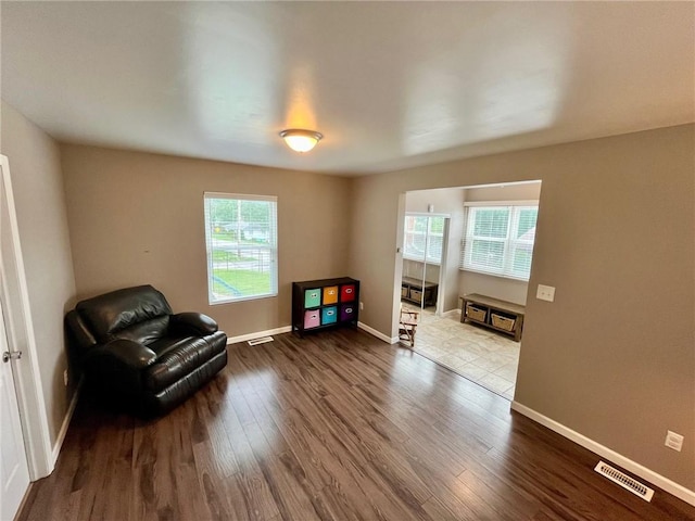 39 Delmont Ave, Delmont, PA 15626 - living area with dark wood-style floors