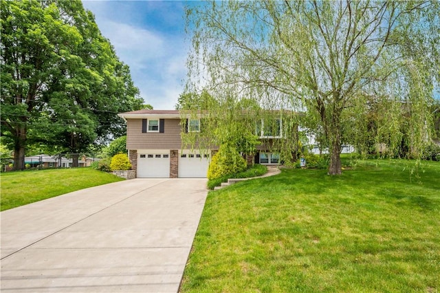 1116 Mcgovern Rd, Chartiers, PA 15342 - view of front facade with a garage, concrete driveway, a front lawn, and stone siding