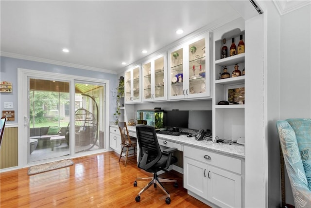 1116 Mcgovern Rd, Chartiers, PA 15342 - home office with built in desk, crown molding, and light wood-style flooring