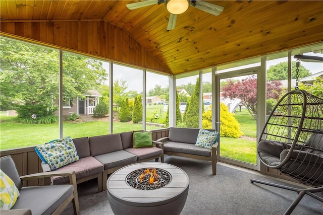 1116 Mcgovern Rd, Chartiers, PA 15342 - sunroom / solarium featuring lofted ceiling, an outdoor living space with a fire pit, plenty of natural light, and ceiling fan