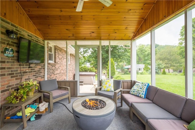 1116 Mcgovern Rd, Chartiers, PA 15342 - sunroom / solarium with an outdoor living space with a fire pit, a jacuzzi, ceiling fan, and lofted ceiling