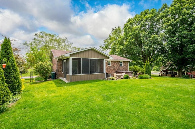 1116 Mcgovern Rd, Chartiers, PA 15342 - back of property with brick siding and a sunroom