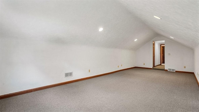 753 Bullcreek, City Of But Se, PA 16002 - additional living space featuring carpet, lofted ceiling, a textured ceiling, and recessed lighting
