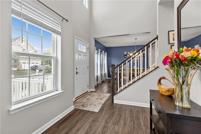 215 Saddle Ridge Dr, North Fayette, PA 15071 - foyer featuring a chandelier, wood finished floors, stairs, and a towering ceiling