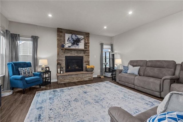 215 Saddle Ridge Dr, North Fayette, PA 15071 - living area featuring healthy amount of natural light, dark wood-style flooring, a stone fireplace, and recessed lighting