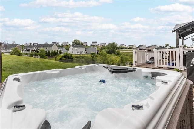 215 Saddle Ridge Dr, North Fayette, PA 15071 - view of pool with a residential view, a hot tub, a wooden deck, and a lawn