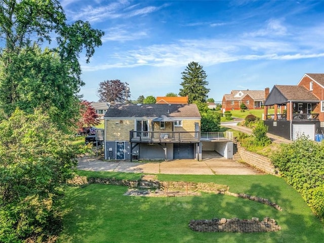 135 Taylor Run Rd, Carroll Twp, PA 15063 - back of house featuring a deck, a residential view, and a yard