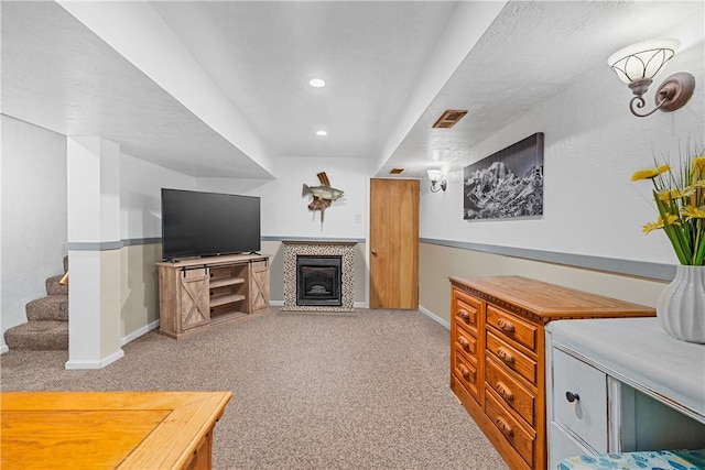 135 Taylor Run Rd, Carroll Twp, PA 15063 - carpeted living area featuring recessed lighting, a fireplace, and stairway