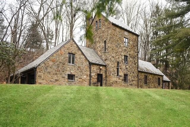 1397 Abers Creek Rd, Monroeville, PA 15146 - rear view of house featuring stone siding, a yard, and a high end roof