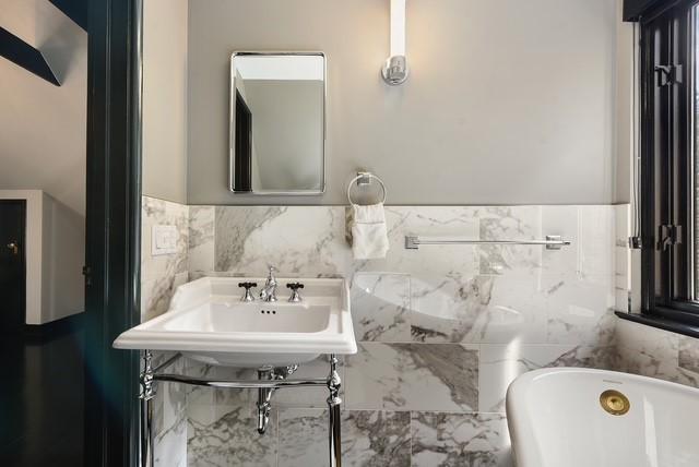 1397 Abers Creek Rd, Monroeville, PA 15146 - full bathroom with a freestanding tub, tile walls, and wainscoting
