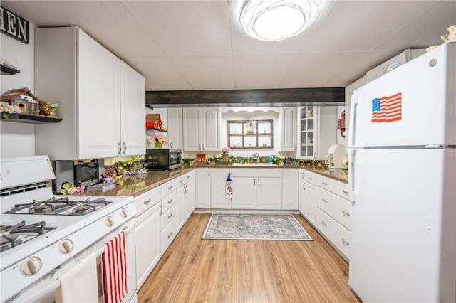 164 Seger Rd, Derry Twp, PA 15627 - kitchen with white appliances, open shelves, light wood-style floors, white cabinetry, and a drop ceiling
