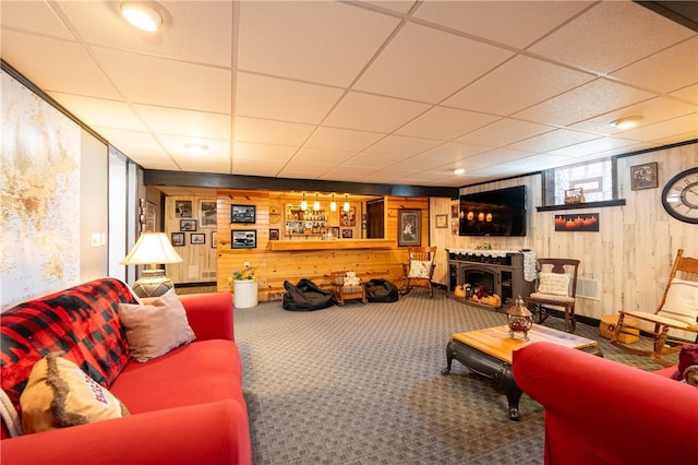 164 Seger Rd, Derry Twp, PA 15627 - carpeted living room with wooden walls and a drop ceiling