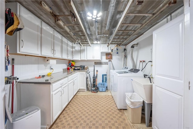 164 Seger Rd, Derry Twp, PA 15627 - washroom with separate washer and dryer, cabinet space, and light flooring