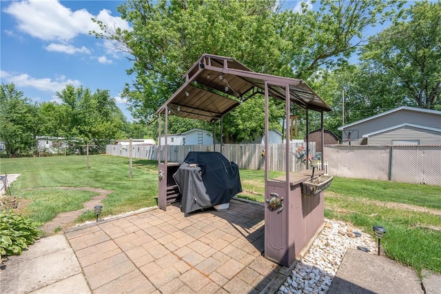 164 Seger Rd, Derry Twp, PA 15627 - fenced backyard with area for grilling, a storage unit, and a patio area