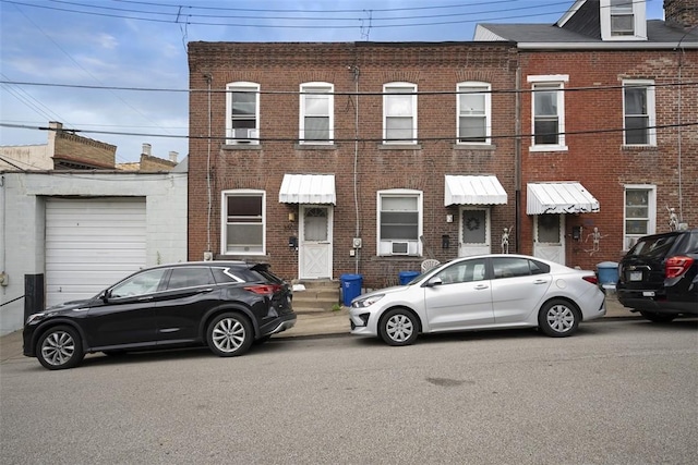 3520 Butler St, Lawrenceville, PA 15201 - view of property featuring brick siding and cooling unit
