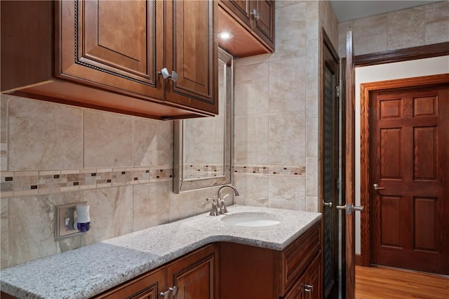 1402 Imperial Dr, Hopewell Twp Bea, PA 15001 - bathroom with vanity, tasteful backsplash, and tile walls