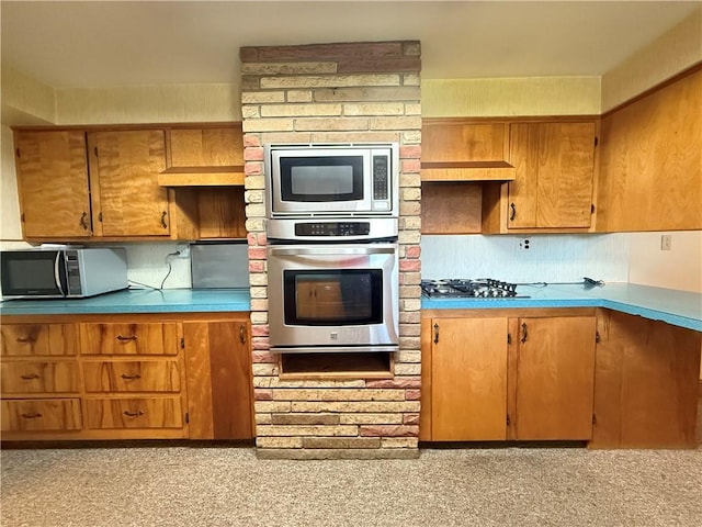 133 Hamburg Rd, Delaware Twp, PA 16154 - kitchen featuring appliances with stainless steel finishes and brown cabinets