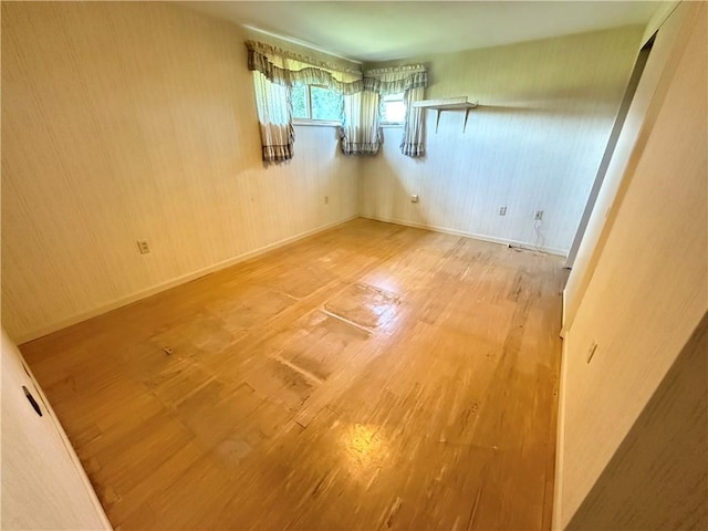 133 Hamburg Rd, Delaware Twp, PA 16154 - empty room with wood finished floors and baseboards