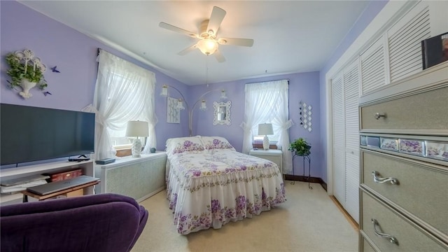 426 Saint Joseph St, Mount Oliver, PA 15210 - bedroom with a closet, light carpet, radiator heating unit, and a ceiling fan