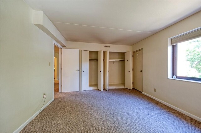 416 Isabella St Unit 404, Oakmont, PA 15139 - unfurnished bedroom with carpet flooring and two closets