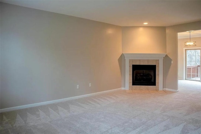 2426 Rochester Rd Unit C, Franklin Park, PA 15143 - unfurnished living room with light colored carpet, recessed lighting, and a tile fireplace