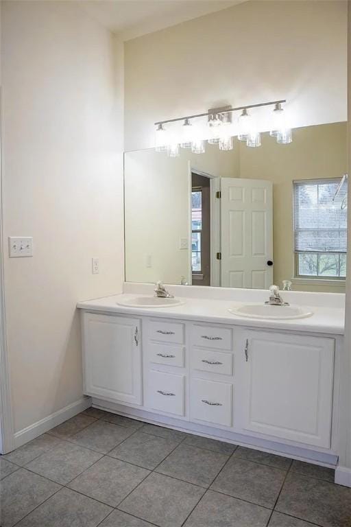 2426 Rochester Rd Unit C, Franklin Park, PA 15143 - bathroom featuring double vanity and tile patterned flooring