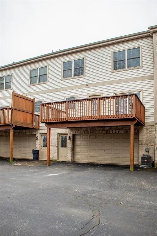 2426 Rochester Rd Unit C, Franklin Park, PA 15143 - rear view of property featuring an attached garage
