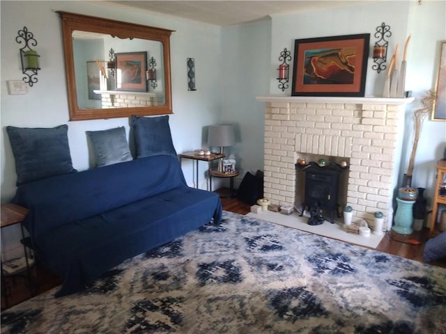 125 Bertha Ave, Donora, PA 15033 - living area with a fireplace and wood finished floors