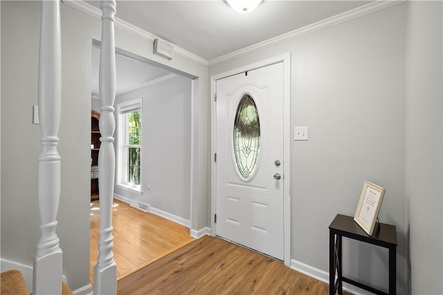 5934 Barnes Ave, Bethel Park, PA 15102 - entrance foyer with crown molding and light wood-style flooring