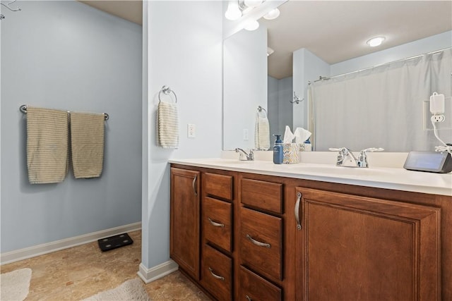 102 Castle View Dr, Kennedy Twp, PA 15136 - bathroom with double vanity and baseboards