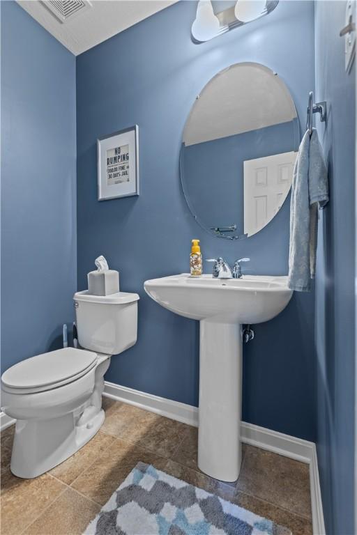 102 Castle View Dr, Kennedy Twp, PA 15136 - bathroom featuring toilet and baseboards