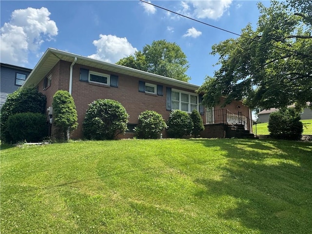 11 Edith St, Center Twp/Homer Cty, PA 15748 - view of front of home featuring brick siding and a front lawn