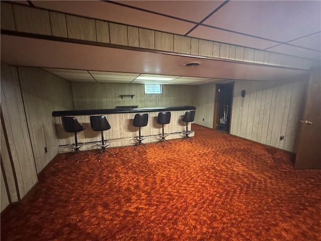 11 Edith St, Center Twp/Homer Cty, PA 15748 - below grade area with carpet flooring, a dry bar, a paneled ceiling, and wood walls