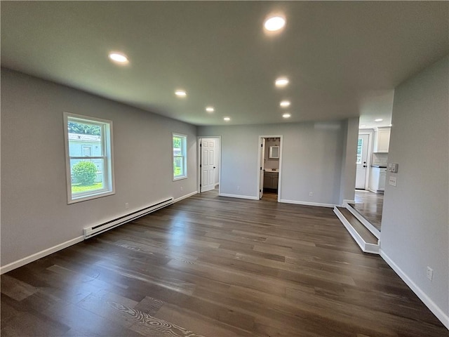 324 Hoover St, Saint Clair Twp, PA 15954 - unfurnished living room featuring a baseboard heating unit, recessed lighting, and dark wood-type flooring