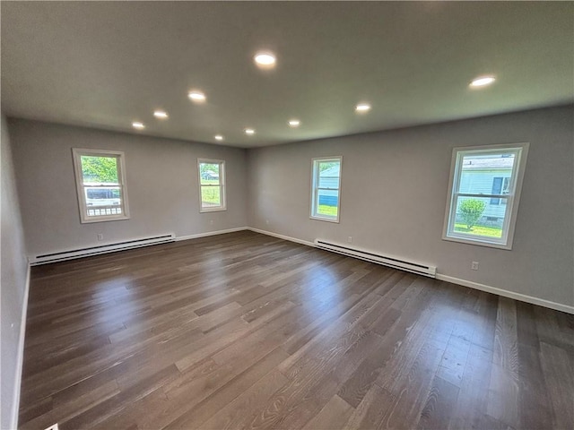 324 Hoover St, Saint Clair Twp, PA 15954 - spare room with a baseboard heating unit, recessed lighting, and dark wood-style floors