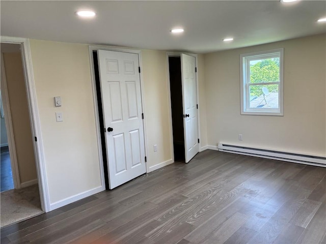 324 Hoover St, Saint Clair Twp, PA 15954 - unfurnished bedroom featuring a baseboard radiator, dark wood finished floors, and recessed lighting