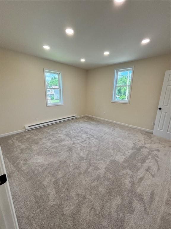 324 Hoover St, Saint Clair Twp, PA 15954 - unfurnished room with a baseboard heating unit, recessed lighting, and carpet flooring