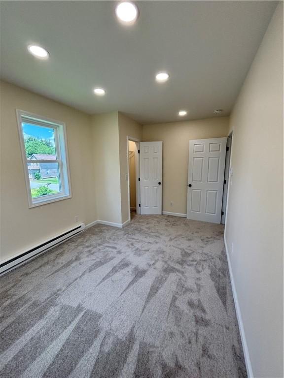 324 Hoover St, Saint Clair Twp, PA 15954 - unfurnished bedroom with carpet, recessed lighting, and a baseboard radiator