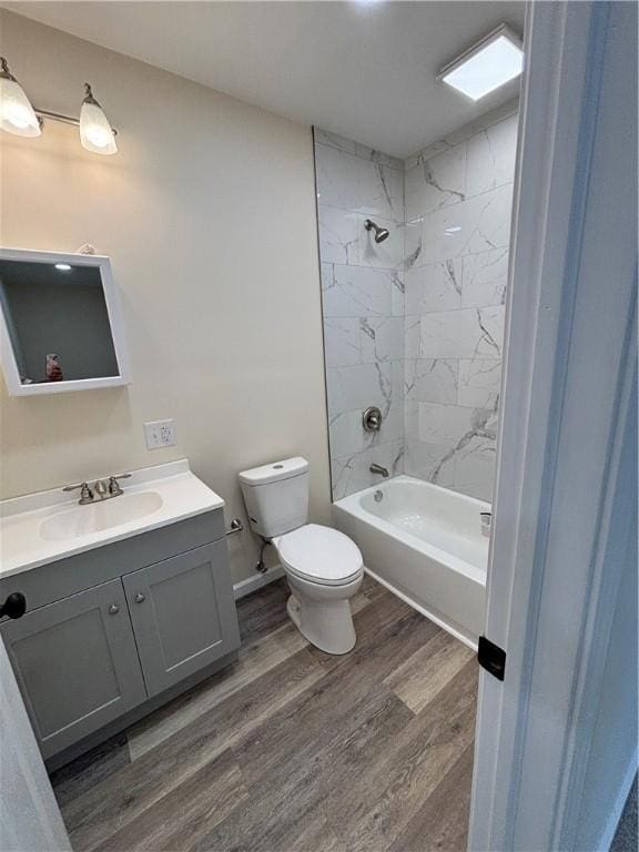 324 Hoover St, Saint Clair Twp, PA 15954 - full bath featuring vanity, wood finished floors, and shower / tub combination