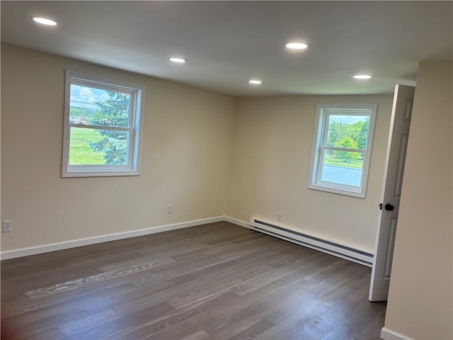 324 Hoover St, Saint Clair Twp, PA 15954 - empty room with baseboard heating, dark wood finished floors, and recessed lighting