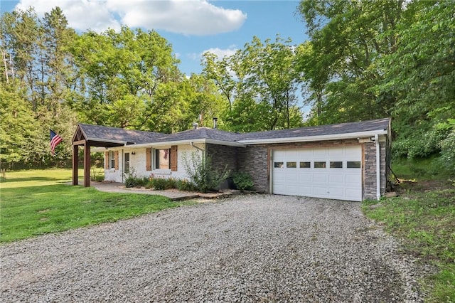 476 Trees Mills Rd, Salem Twp, PA 15601 - ranch-style home featuring driveway, an attached garage, and a front lawn