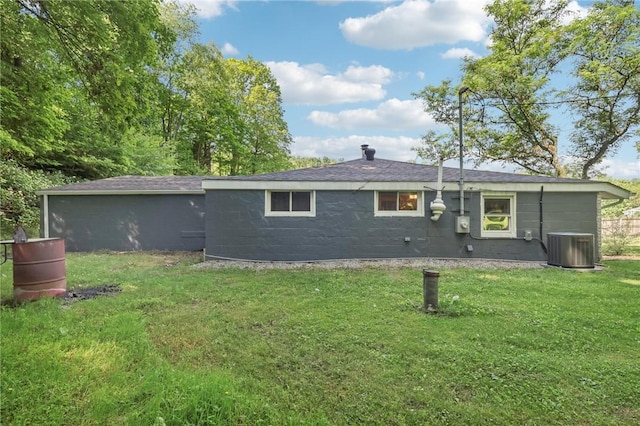 476 Trees Mills Rd, Salem Twp, PA 15601 - back of house featuring a yard and concrete block siding